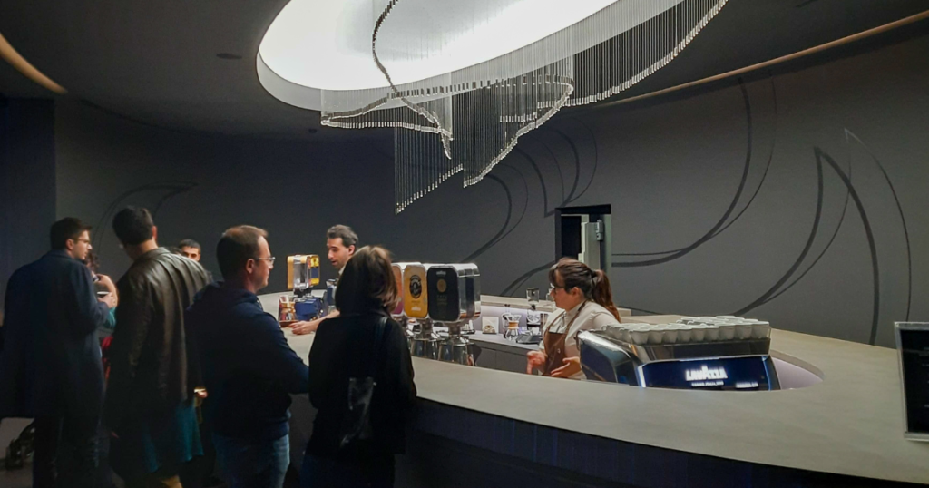 people in Lavazza serving coffee  